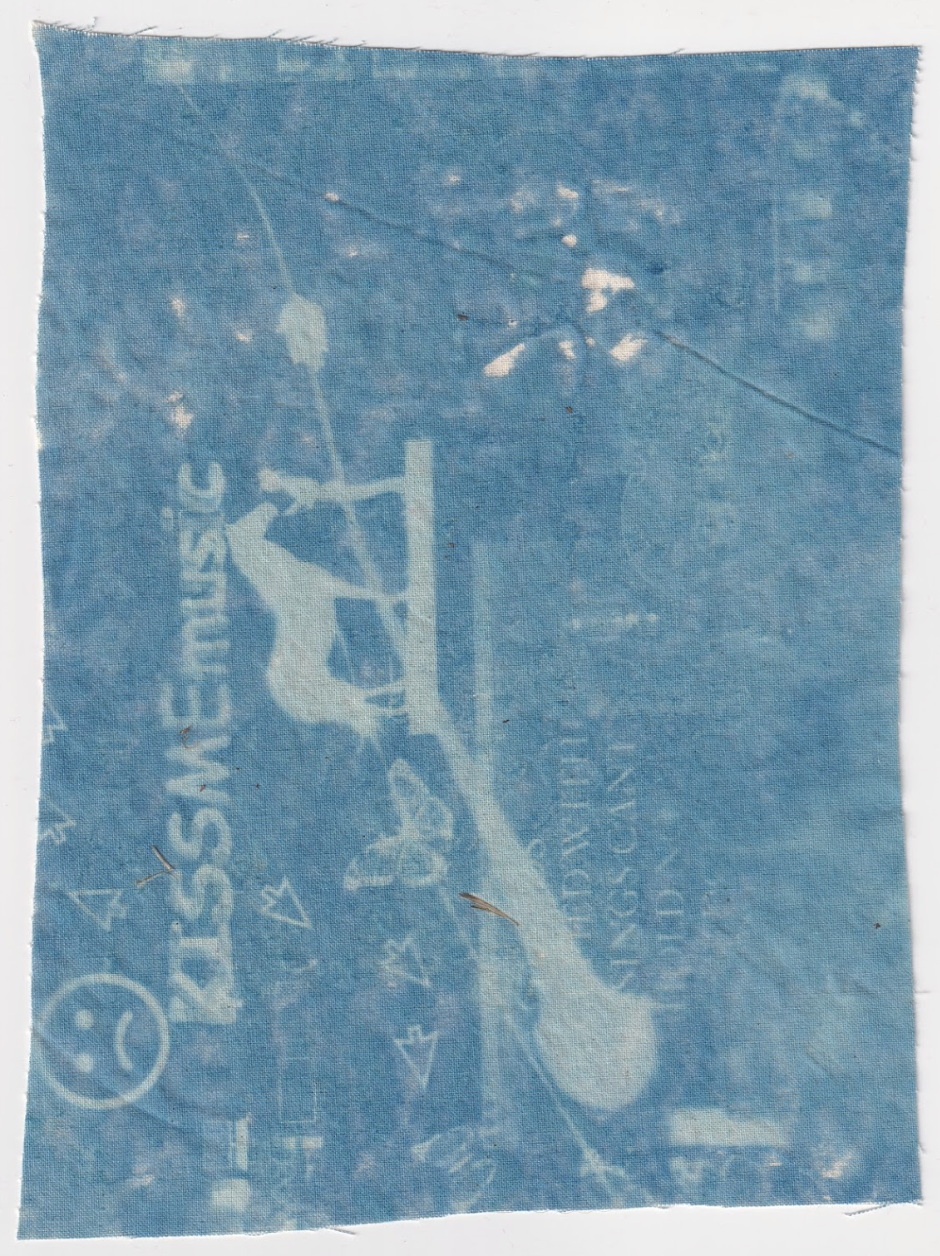 Cyanotype print of a desktop collage of images, looks degraded