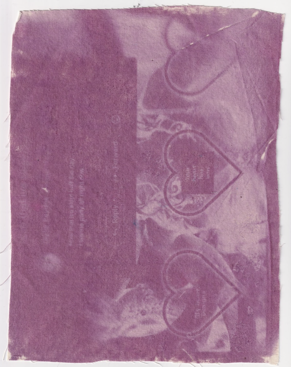 Cyanotype print of a desktop collage of images, looks degraded